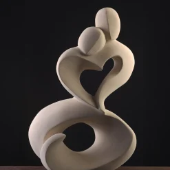Creazioni di Andrea Serra Scultura in pietra Il Sorriso del Cuore