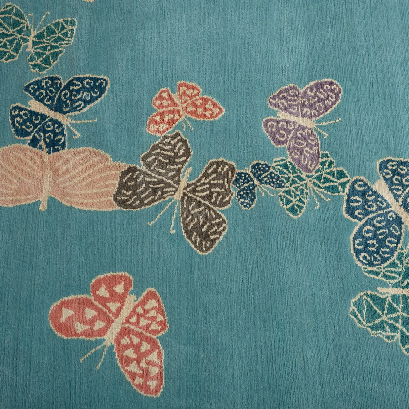 Sergio Mannino Studio Tappeto Spirit in the Sky Butterfly Blue realizzato a mano in lana e seta